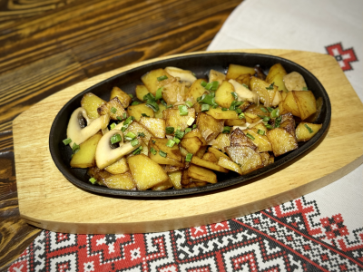 Жареный картофель с грибами в ресторане Casa Maria в Москве